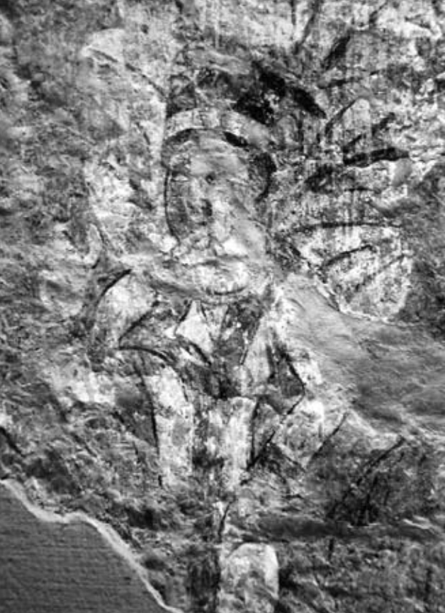 FileDilberjin._Man_in_white_caftan_coming_out_of_a_tree.jpg