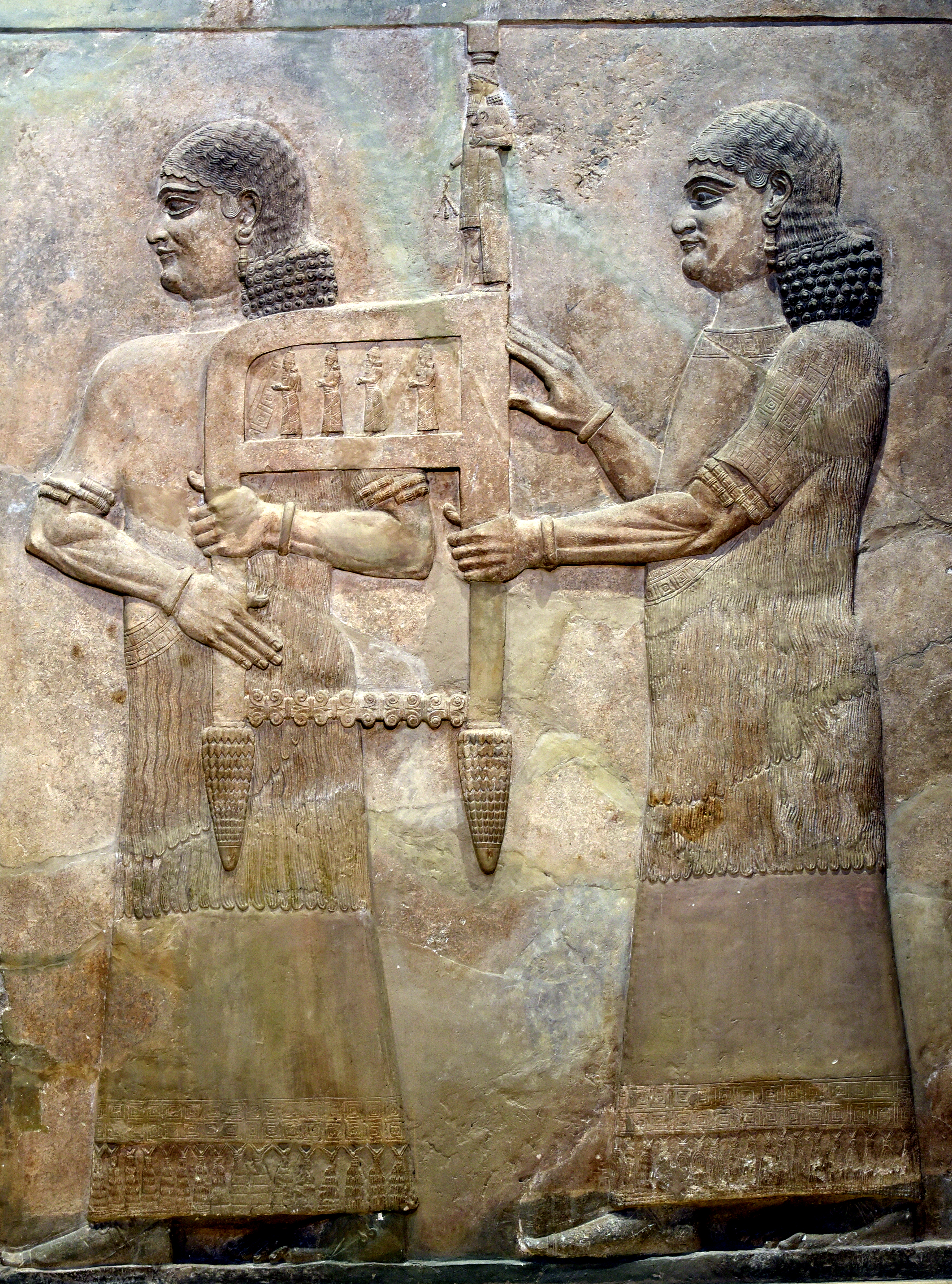FileAssyrian_attendants_carrying_the_throne_of_Sargon_II_part_of_a_tributary_scene_from_Khorsabad_Iraq._Iraq_Museum.jpg