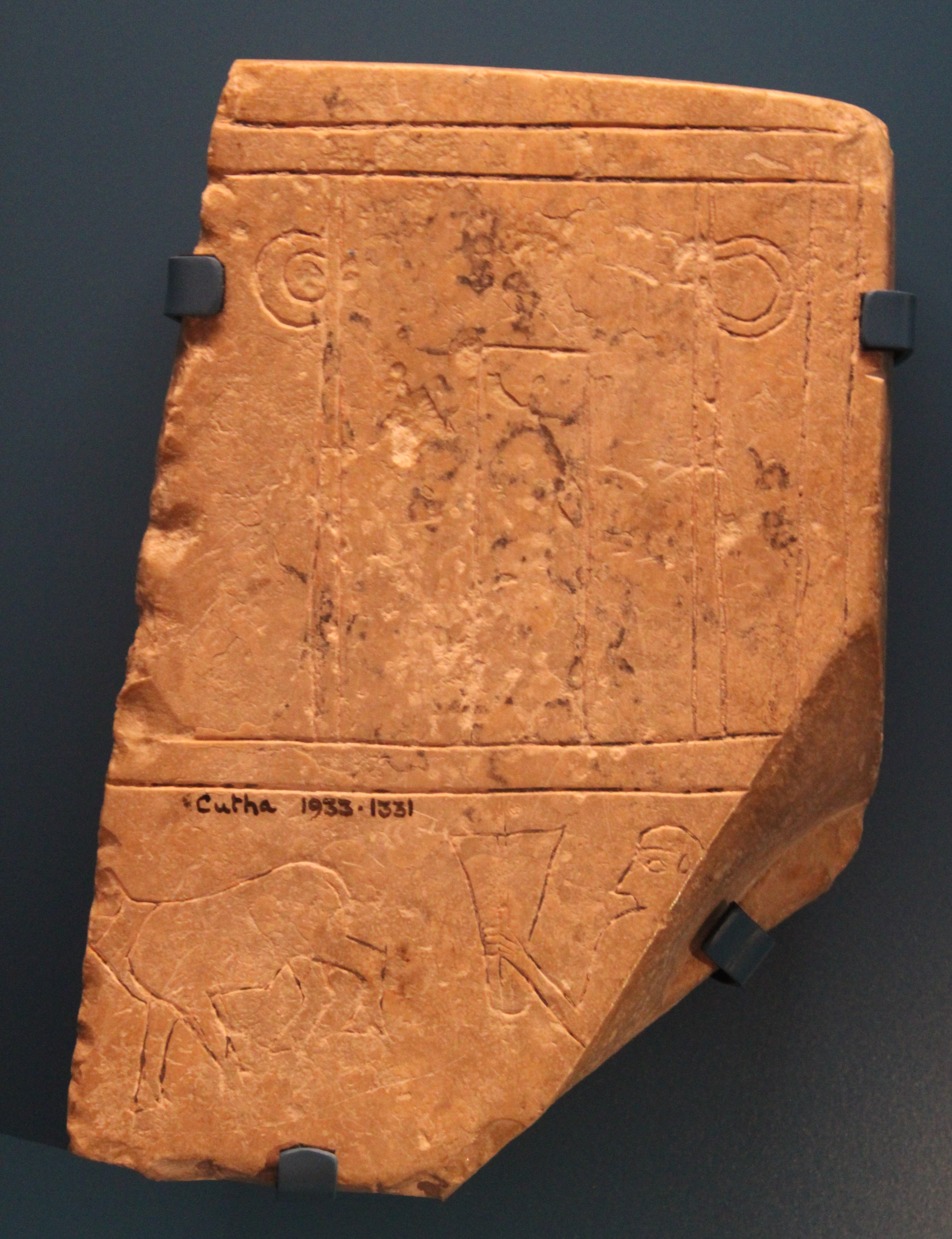 FileIncised_stone_plaque_Cutha_AN1933.1331.jpg