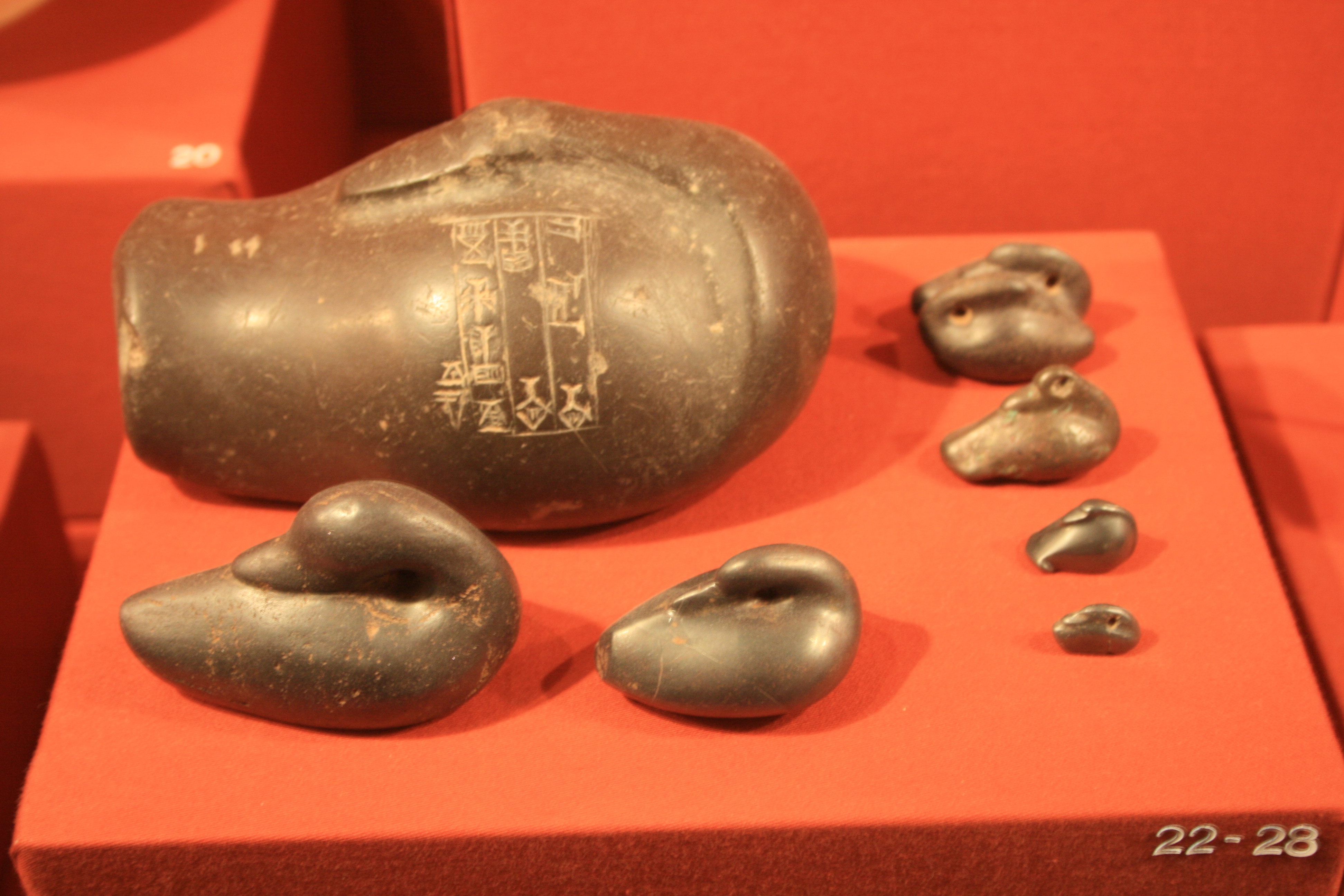 FileEconomy_in_Mesopotamia_Weights_Bronze_Hematite_or_Magnetite_10450476463.jpg