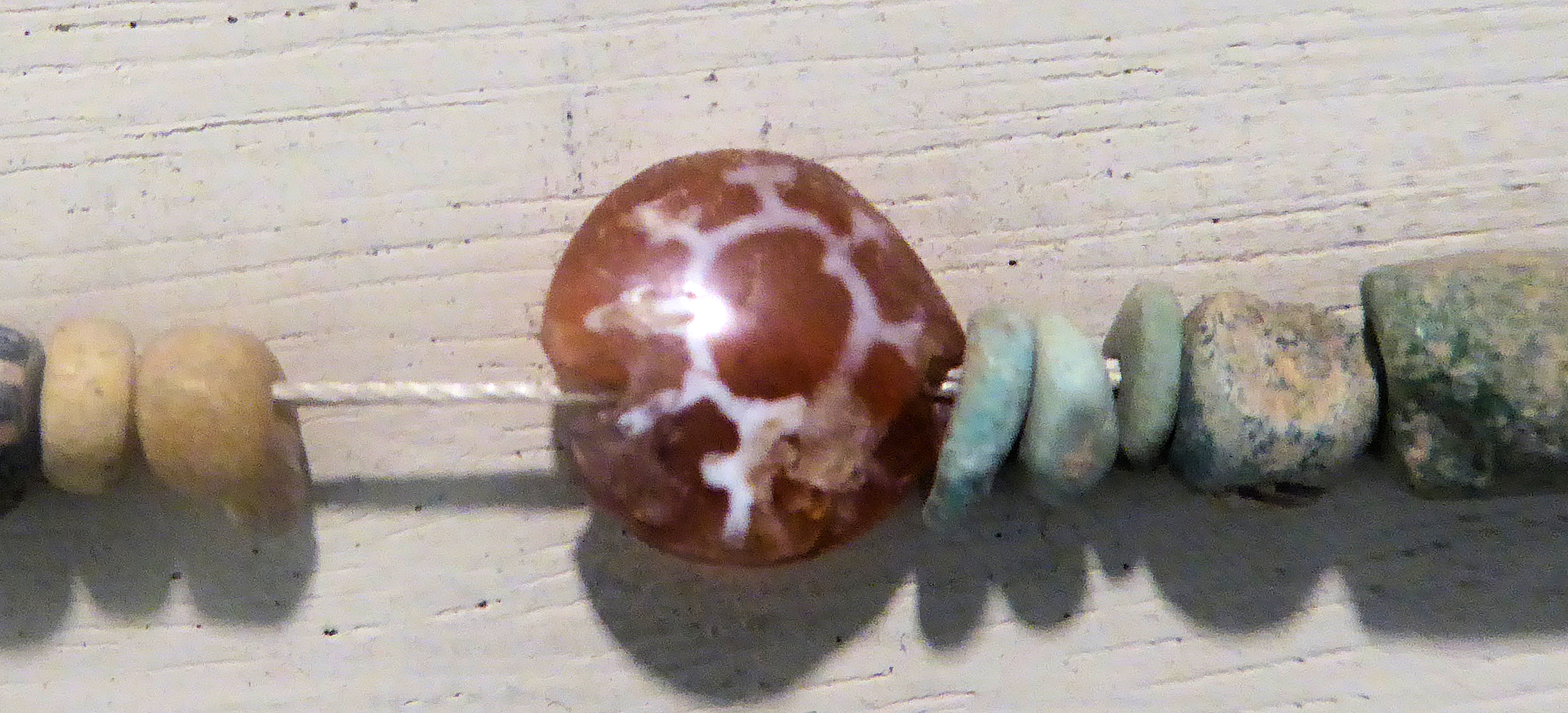 FileEtched_carnelian_beads_Egypt_Ptolemaic_Period_London_Petrie_Museum_of_Egyptian_Archaeology_UC51264_detail.jpg