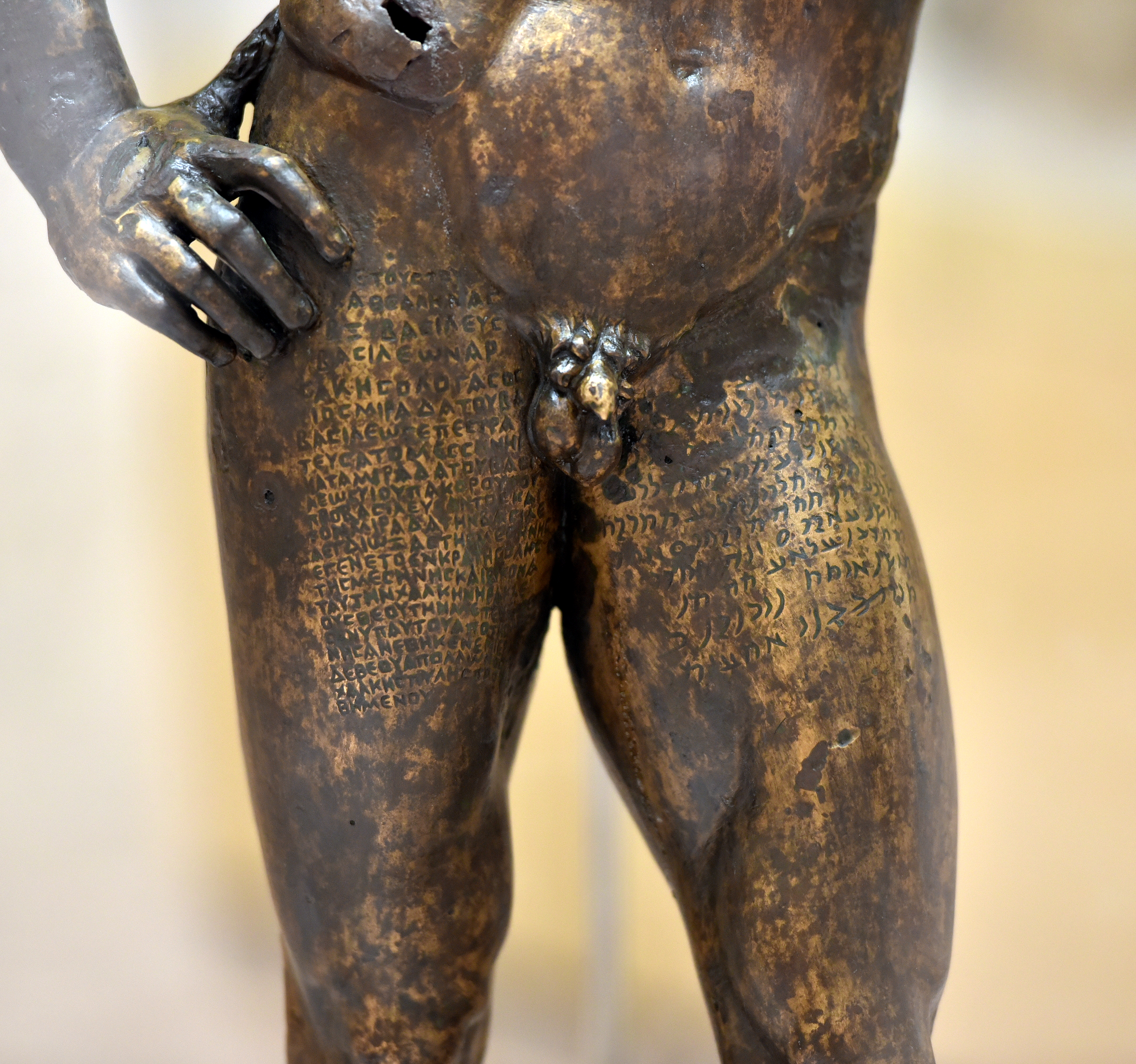 FileDetail_inscribed_Greek_and_Parthian_script_lower_part_of_a_bronze_statuette_of_Hercules_from_Seleucia_on_the_Tigris_Iraq._Iraq_Museum.jpg