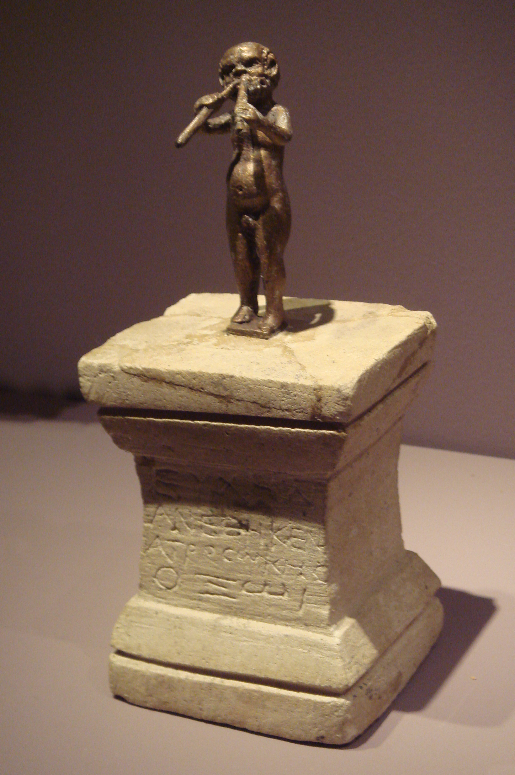 FileAltar_to_God_Oxus_with_Marsias_playing_the_aolos_Temple_of_the_Oxus_Takht-i_Sangin_dated_2nd_century_BCE.jpg